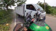 Biker's Helmet Cam Captures Close Call With Truck