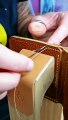 Stitching by hand pockets on a leather wallet - Leathercraft