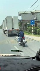 Truck's Unsecured Cargo Precariously Teeters