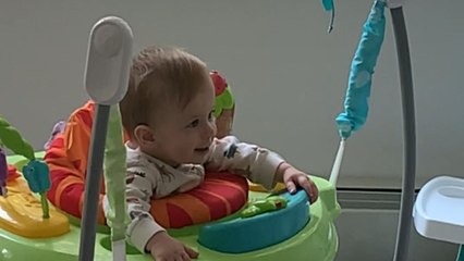 Baby boy can't stop laughing while watching fierce lions hunting prey