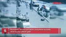 Otomobilin altında kalmaktan saniyelerle kurtuldu, rahat tavırları dikkat çekti