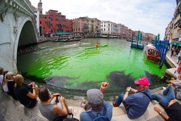 Venice’s Grand Canal Turned Bright Green This Weekend — See the Photos