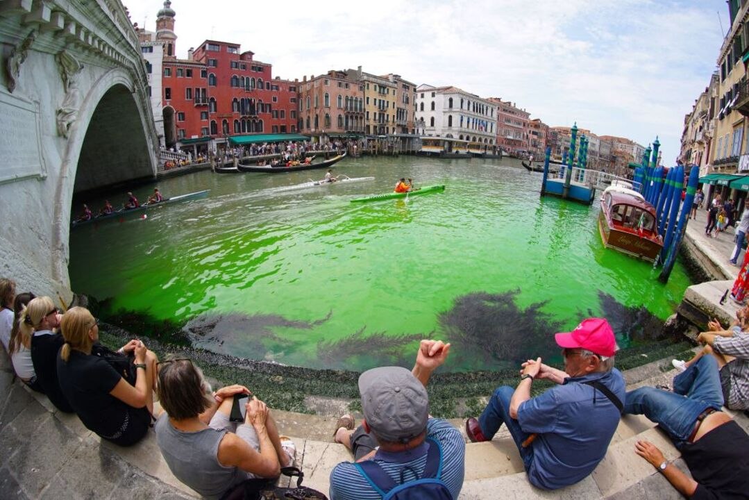 Venice’s Grand Canal Turned Bright Green This Weekend — See the Photos