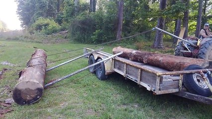 Winching A Log Onto The Trailer