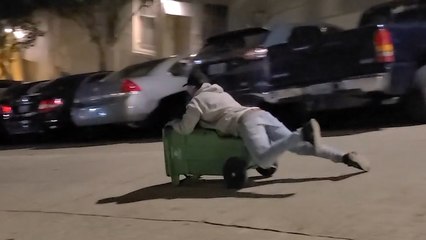 Man Slides Downhill on A TRASH CAN!!