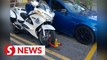 Cop gets summons for parking motorcycle at apartment’s disabled parking lot