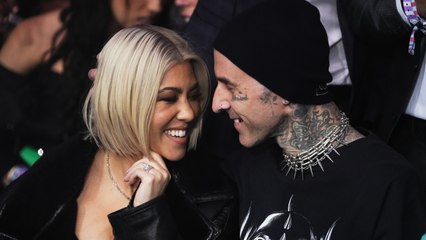 Kourtney Kardashian Toughened Up Her Plunging Lace Slip Dress With a Bomber Jacket and Combat Boots