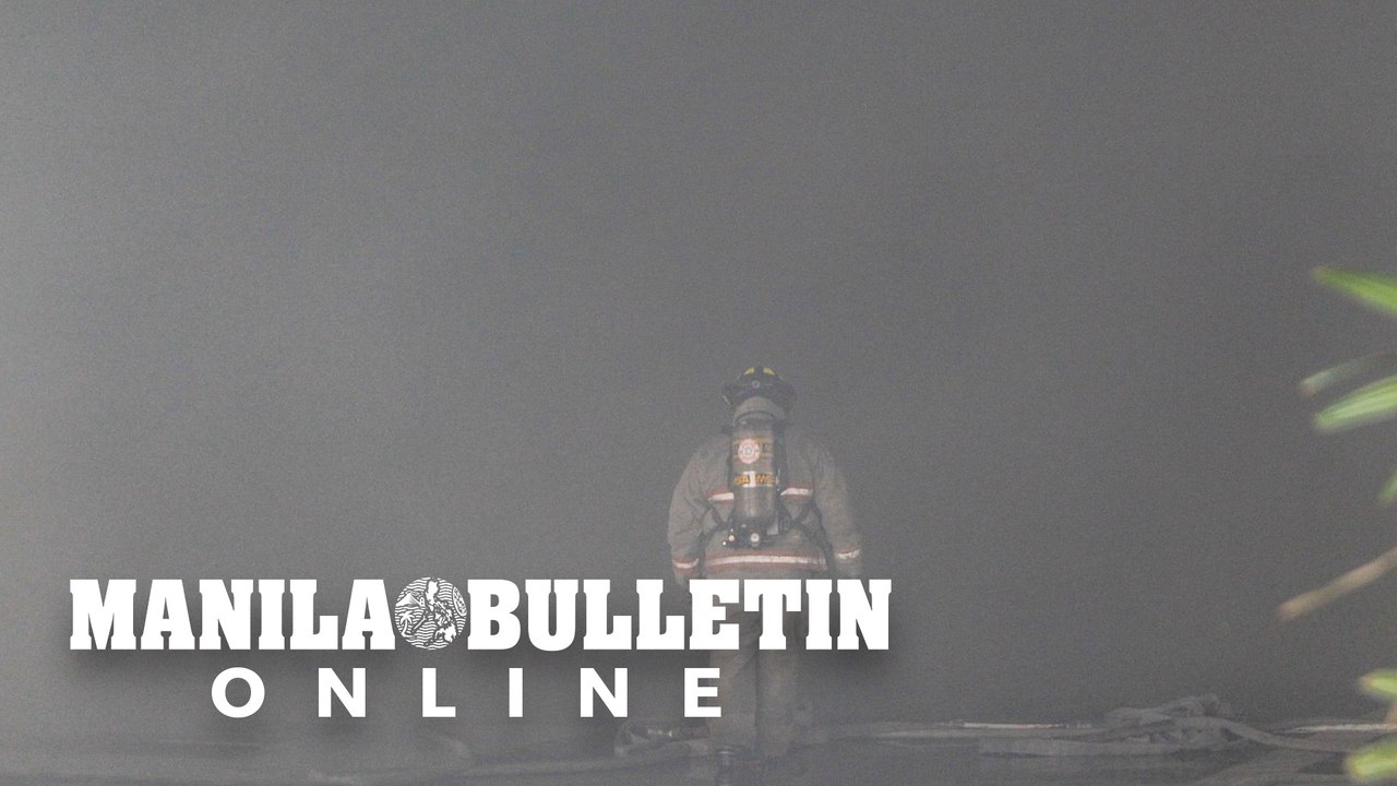 Firefighters extinguish LTO and commercial buil...