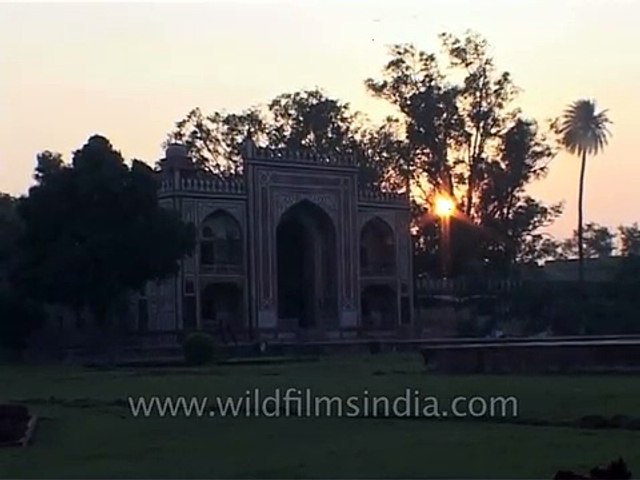 Taj Mahal mausoleum complex covered in mist