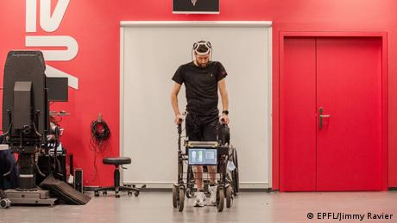Brain implants help paraplegic man walk again