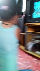 TOddlers WATCHING AND LISTENING TO MUSIC ON TV