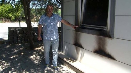 Emlak ofisini kundaklamaya çalıştı