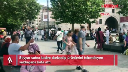 Seyyar satıcı kadını darbeden saldırgana kafa attı