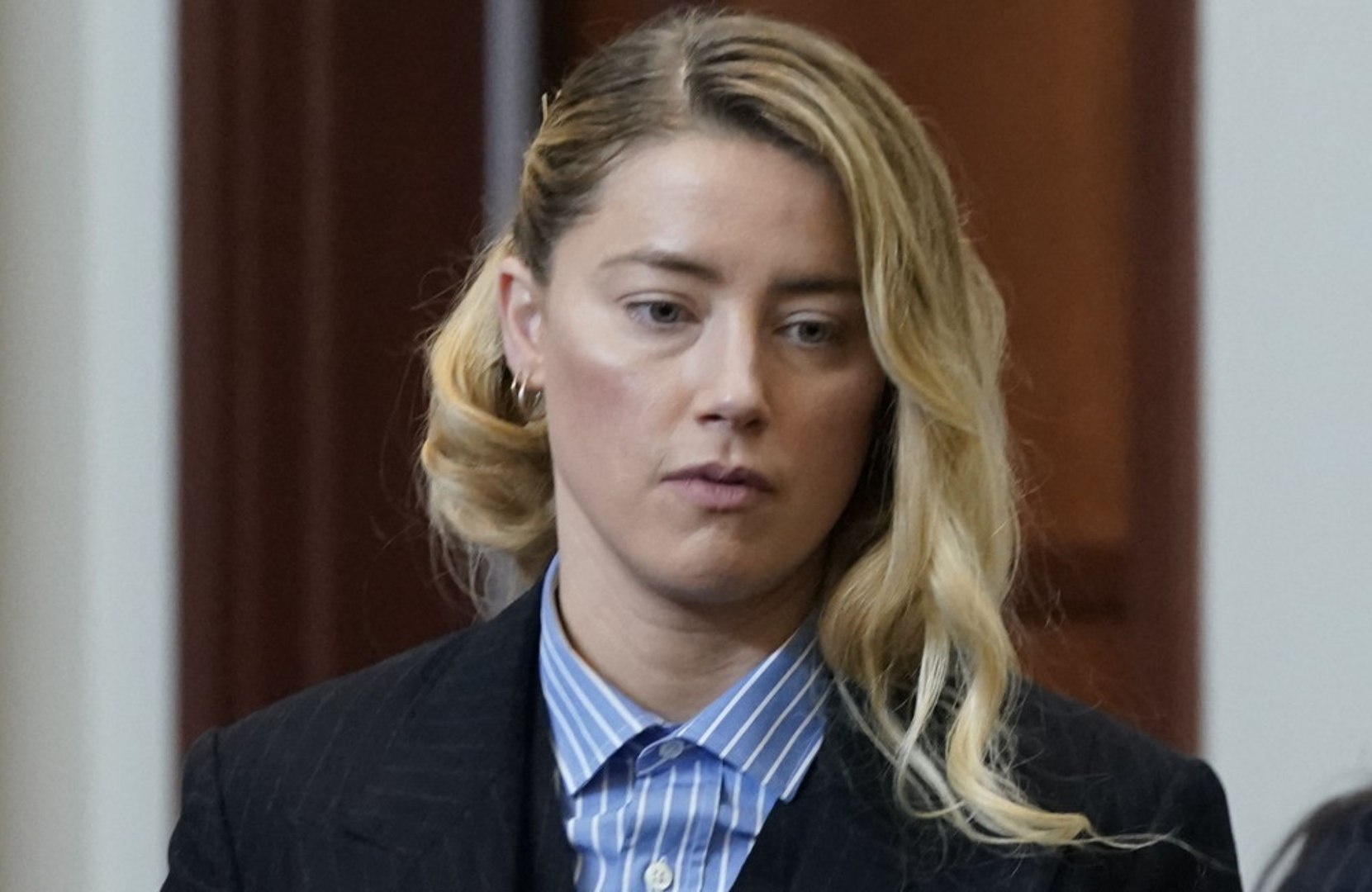 Amber Heard 'still loves' Johnny Depp