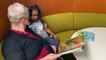Grandmother reads to child at Mohammed Bin Rashid Library