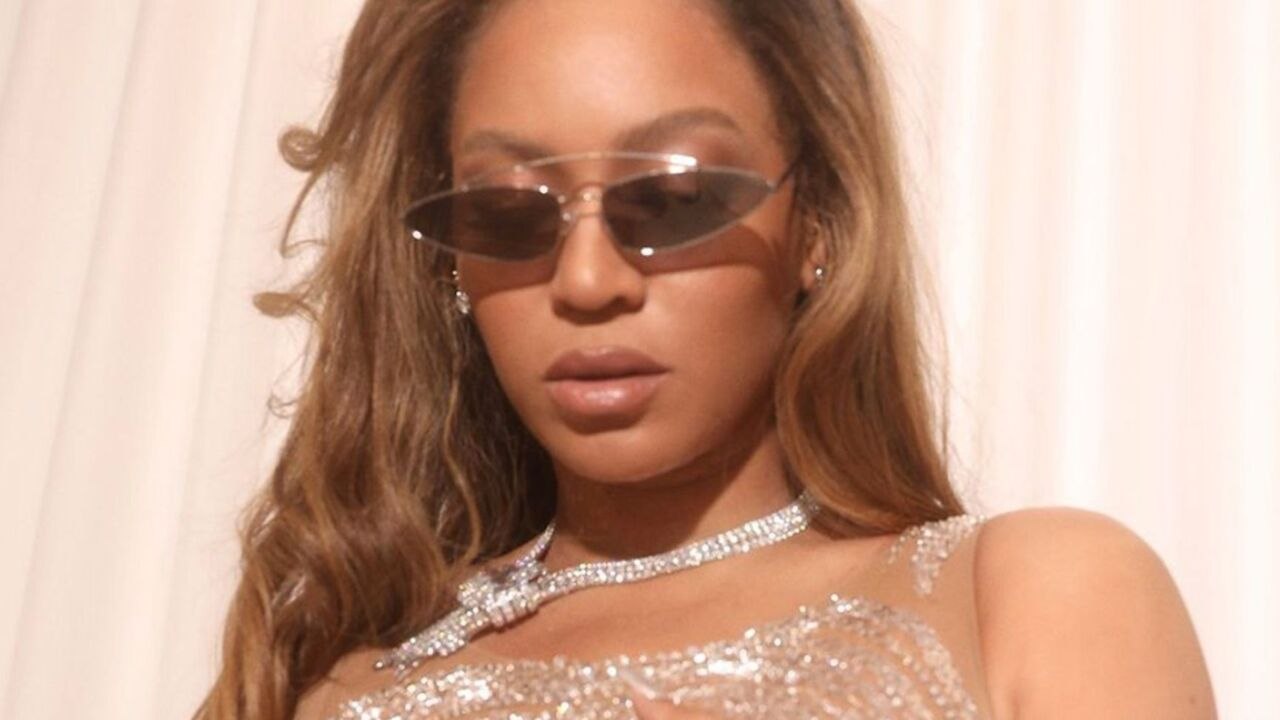 Beyoncé Embraced Barbiecore in a Pink Fishnet Bodysuit and Matching Latex Trench