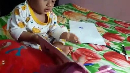 Playing while learning, Hanum looks happy and excited