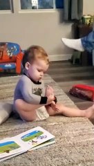 Toddler hilariously finds his toes absolutely fascinating #Shorts