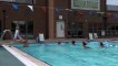 Swimmers at Charlton lido enjoy a splash around in the heat