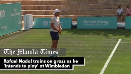 Rafael Nadal trains on grass as he 'intends to play' at Wimbledon