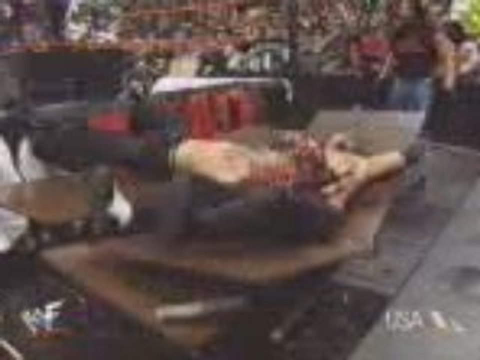 WWE- Jeff & Matt Hardy go Through Tables
