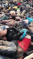 Miles de migrantes en el suelo frente a la valla de Melilla