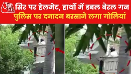 Tải video: Kanpur: Man in helmet fired bullets on police from balcony