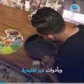 فنان مصري يستعمل أدوات غير تقليدية في أعماله الفنية