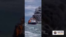 Two rescued after motor cruiser catches fire and sinks