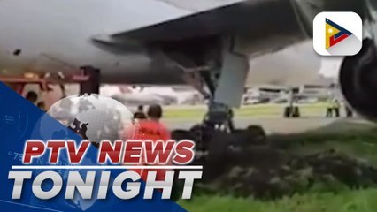 Airplane sinks in soft portion of ground upon landing in NAIA