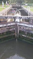 The final lock as  Alex and Emma  finish their pedal challenge at Hatton Locks Cafe