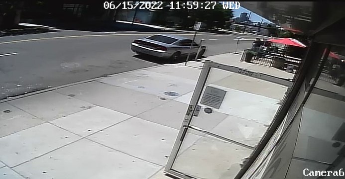 Crashing Truck Narrowly Misses Two Pedestrians