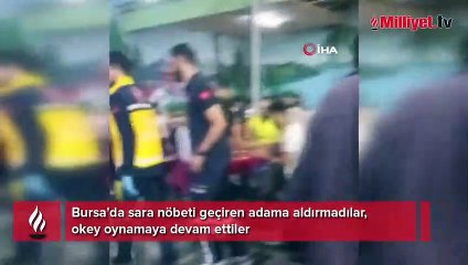 Okey oynamaya devam! Nöbet geçiren adama aldırmadılar