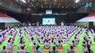 Arvind Kejriwal performs Yoga with hundreds of others at Delhi Stadium
