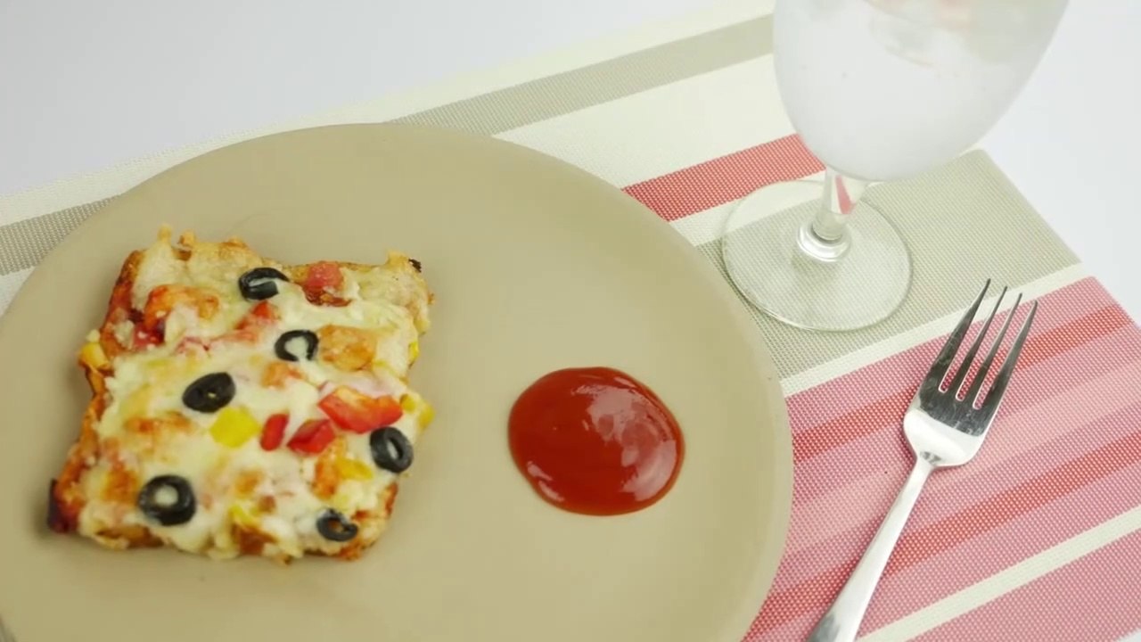 Bread Pizza Recipe by Yummilicious