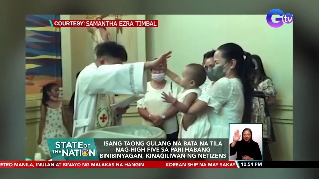 Isang taong gulang na bata na tila nag-high five sa pari habang binibinyagan, kinagiliwan ng netizens | SONA
