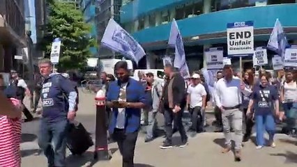 Uber drivers protest outside offices in Aldgate Tower. Credit:Yaseen Aslam