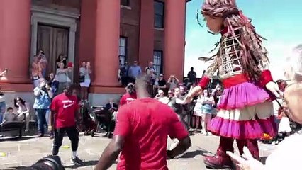 Little Amal has been to visit Liverpool’s waterfront, as part of her journey for World Refugee Week