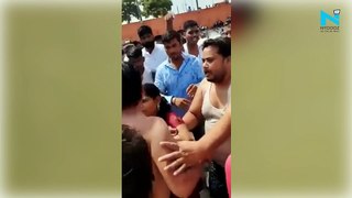 On Camera, man beaten for Kissing wife while bathing in Ayodhya River