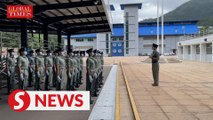 Hong Kong police officers perform PLA-style foot drills