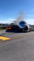Passengers Evacuate Red Air Flight After Plane Catches Fire on Runway