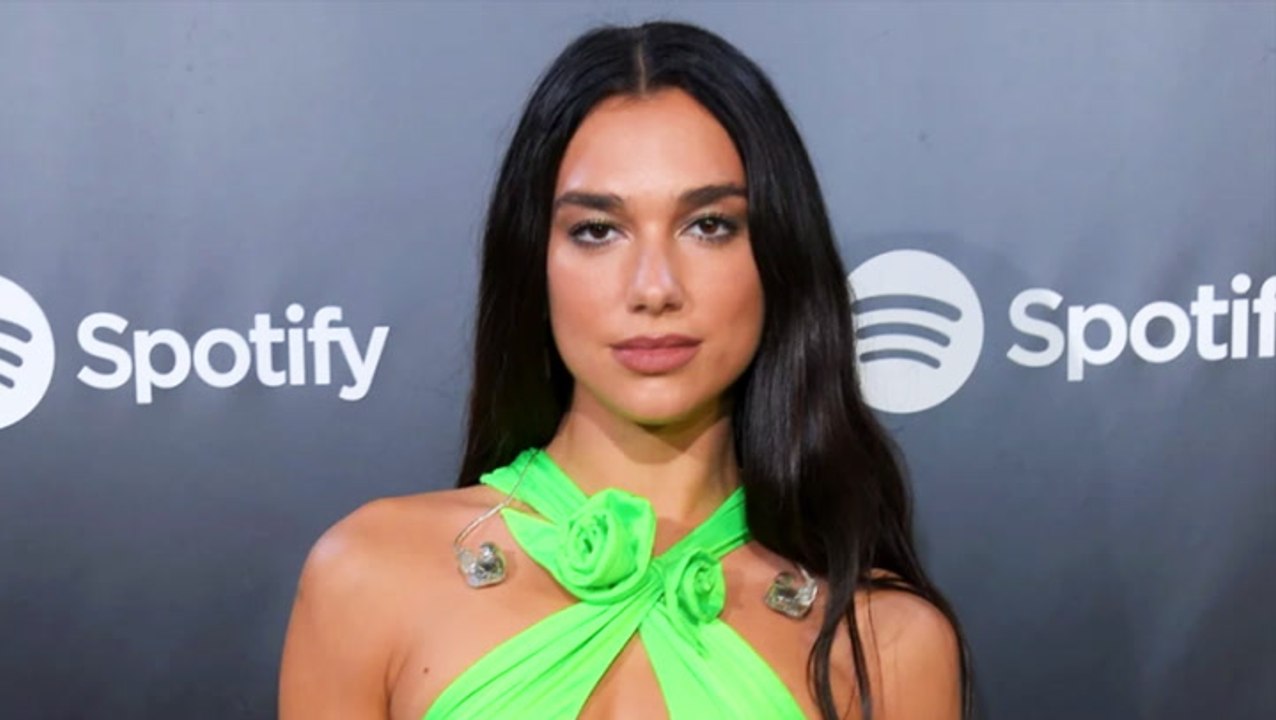 Dua Lipa Sued Again for Posting Paparazzi Photos of Herself | Billboard News