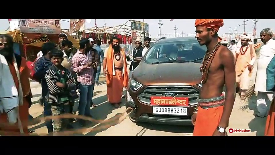 Kumbh Mela 2019: Not a magic trick, Naga sadhu pulls a car with power of 'Tapasya'