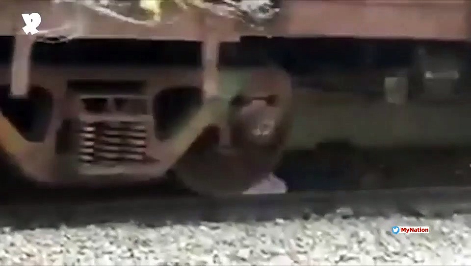 Andhra man survives death while lying under moving train (Video)