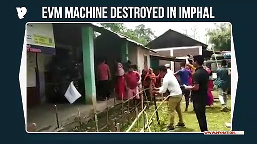 Crowd storms into Imphal polling station, damages EVM