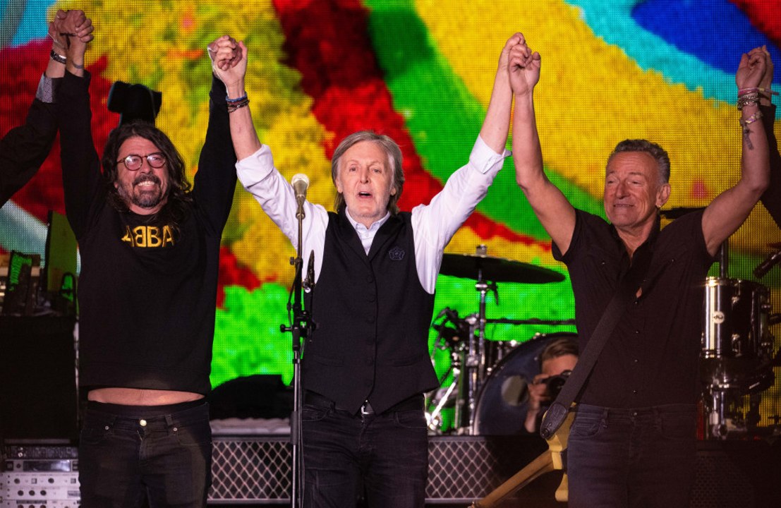 Back together: Sir Paul McCartney enjoys virtual duet with John Lennon at Glastonbury