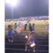 Talented Fire Baton Twirler Shows off Her Skill at High School Football Game