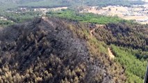 Marmaris’te 5 gün süren ve 4 bin 500 hektar ormanın zarar gördüğü yangından geriye bu manzara kaldı
