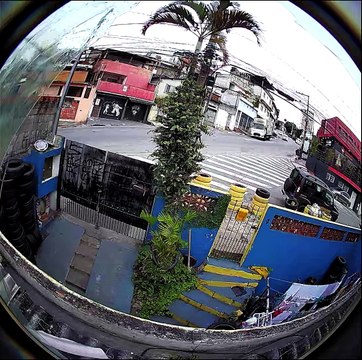 Turning Truck Tips Barely Misses Motorcyclist