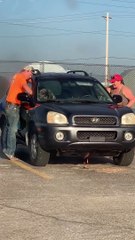 People Extinguish Flames and Keep Dog Safe